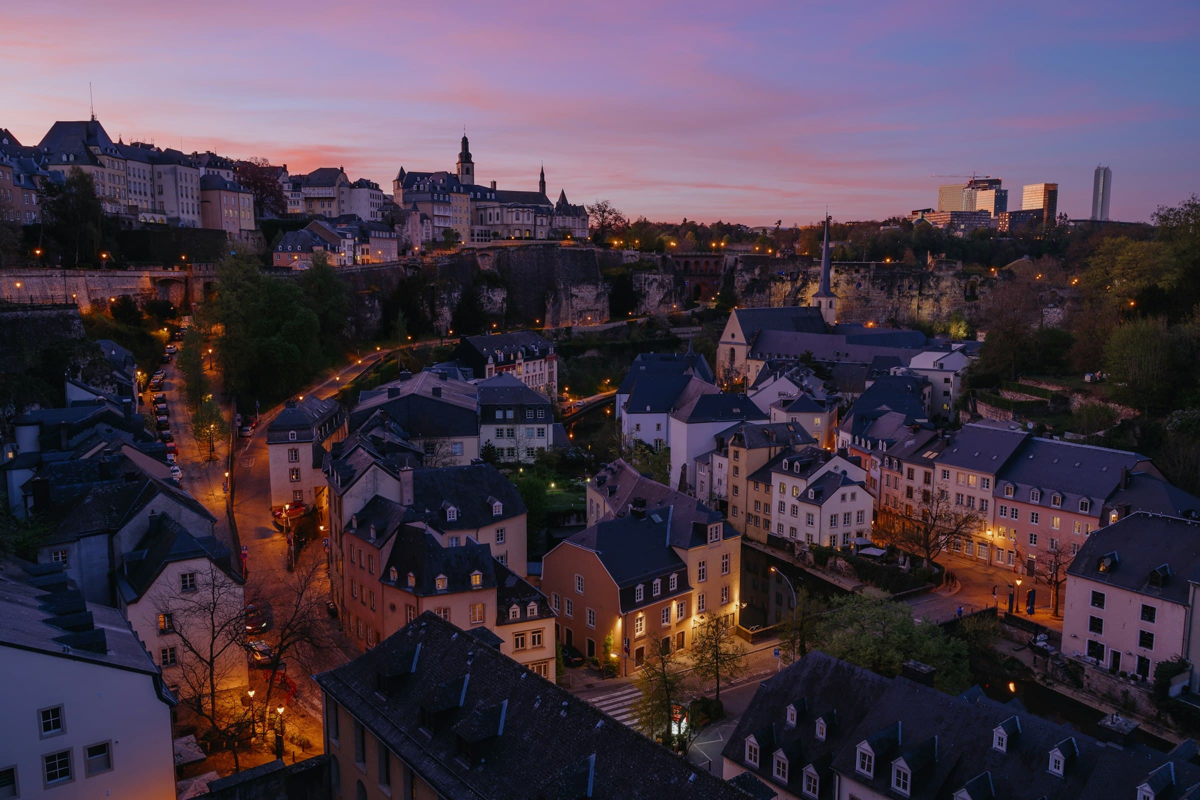 Luxembourg City at dusk, the old town in the Grund below the upper city